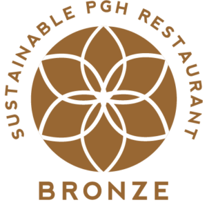 Bronze level designation symbol for restaurants