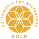 Gold level designation symbol for restaurants