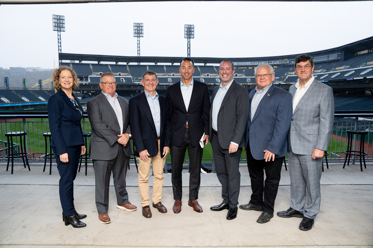 Group photo of CEOs for Sustainability members. From left to right: Jana Lake, President of 3R Sustainability; Ned Eldridge, CEO of eLoop; Ryan S. Ruskin, President & CEO of The Ruskin Group; Troy Geanopulos, CEO of The Efficiency Network; Scott Tobe, CEO of Signature Wealth; Albrecht Powell, Pittsburgh Office Managing Director of Accenture; and Bob Nutting, CEO of the Pittsburgh Pirates.